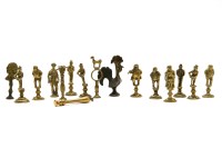 Lot 92 - Eleven Victorian brass figural pipe tampers
