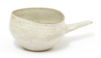 Lot 580 - A glazed stoneware pourer