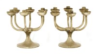 Lot 569 - A pair of silver six-branch candlesticks