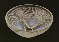 Lot 267 - A Lalique 'Coquilles' opalescent glass bowl