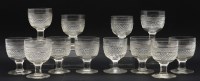Lot 198 - A matched set of twelve 19th century hobnail cut wine glasses