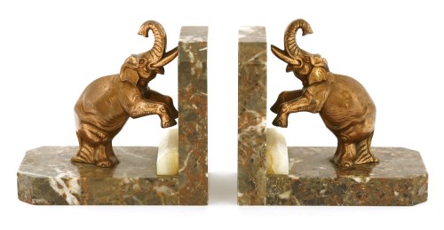 Lot 330 - A pair of Art Deco marble and spelter bookends