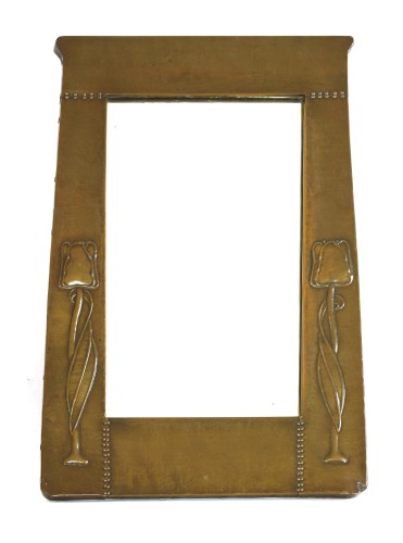 Lot 8 - An Art Nouveau copper framed mirror