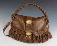 Lot 1200 - A Miu Miu brown leather coffer handbag