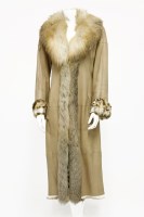 Lot 1361 - A cream leather coat with fox fur collar