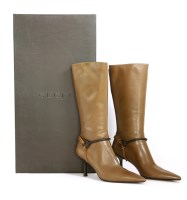 Lot 1414 - A pair of Gucci tan smooth leather mid-length high heel boots