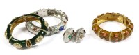 Lot 1524 - An hinged bangle and earring suite
