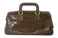 Lot 1224 - A Donna Karen brown crocodile-skin bowling handbag