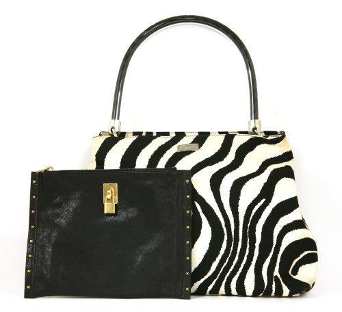 Lot 1037 - An Escada zebra patterned tote shopper handbag