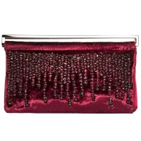Lot 1141 - A Gucci claret velvet evening clutch handbag