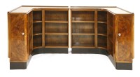 Lot 361 - A pair of Art Deco walnut corner bookcases