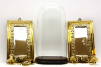Lot 362 - A pair of Arts and Crafts brass framed wall mirrors
