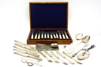 Lot 214 - A set of five silver fruit knives and forks