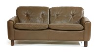 Lot 669 - A brown leather two-seater sofa