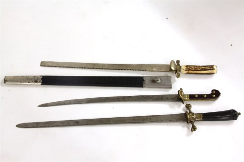 Lot 447 - Three 18th century German hunting swords