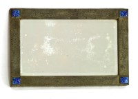 Lot 147 - A pewter mirror