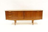 Lot 542 - A teak sideboard