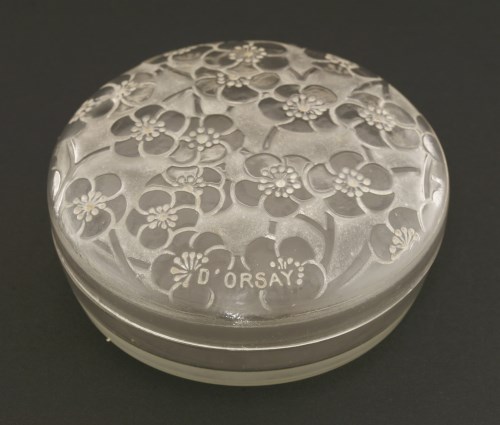 Lot 265 - A Lalique moulded glass powder pot and cover