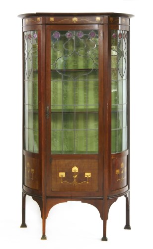 Lot 145 - An Art Nouveau bow front display cabinet