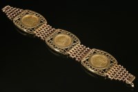 Lot 500 - A 9ct gold seven row gate bracelet