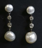 Lot 120 - A pair of Belle Époque pearl and diamond earrings