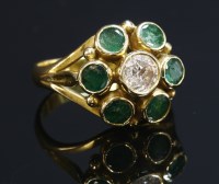 Lot 267 - A diamond and emerald gold cluster ring