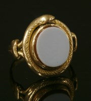 Lot 9 - A gold sardonyx ouroboros ring