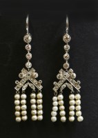 Lot 114 - A pair of Art Deco diamond and seed pearl tassel drop earrings