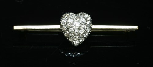 Lot 57 - A diamond set heart-shaped bar brooch