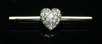 Lot 57 - A diamond set heart-shaped bar brooch