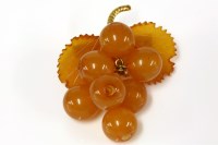 Lot 134 - An amber bead brooch in the form of grapes
