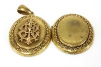 Lot 135 - A Victorian gold oval locket (broken)