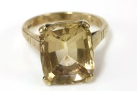 Lot 149 - A 9ct gold single stone cushion shaped faceted citrine ring