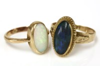 Lot 156 - A gold single stone opal cabochon ring