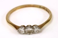 Lot 148 - A gold three stone diamond ring