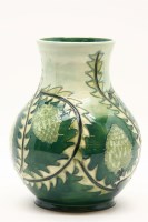 Lot 253 - A Moorcroft 'Banksia' pattern vase