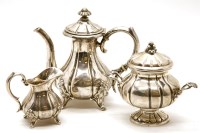 Lot 232 - A miniature Continental three piece tea set