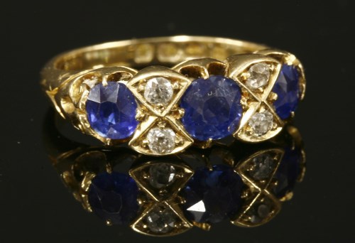 Lot 54 - An 18ct gold Victorian sapphire and diamond carved head ring