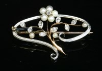 Lot 124 - An Art Nouveau diamond and seed pearl brooch