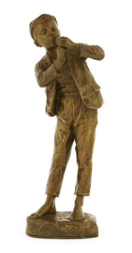 Lot 25 - A bronze figure of a boy lighting a cigarette