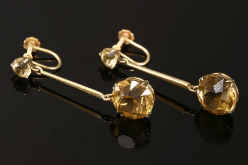 Lot 18 - A pair of gold smokey quartz coloured paste stone drop earrings