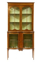 Lot 666 - An Edwardian inlaid mahogany display cabinet