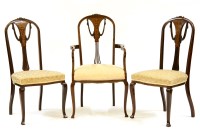 Lot 571 - An Edwardian inlaid mahogany elbow chair