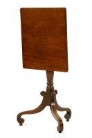 Lot 647 - A Regency mahogany tilt top lamp table