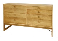 Lot 457 - A light oak eight-drawer chest