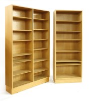 Lot 392 - Two light oak open bookcases