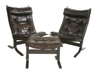 Lot 510 - A pair of bentwood and leather lounge chairs