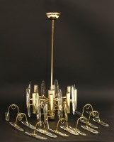 Lot 550 - A twelve-light brass and crystal chandelier
