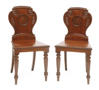 Lot 38 - A pair of George IV mahogany hall chairs