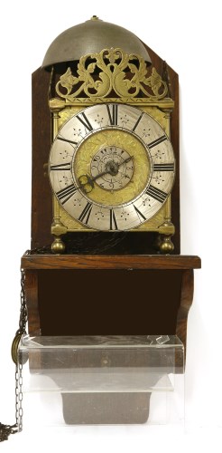Lot 21 - A brass lantern clock